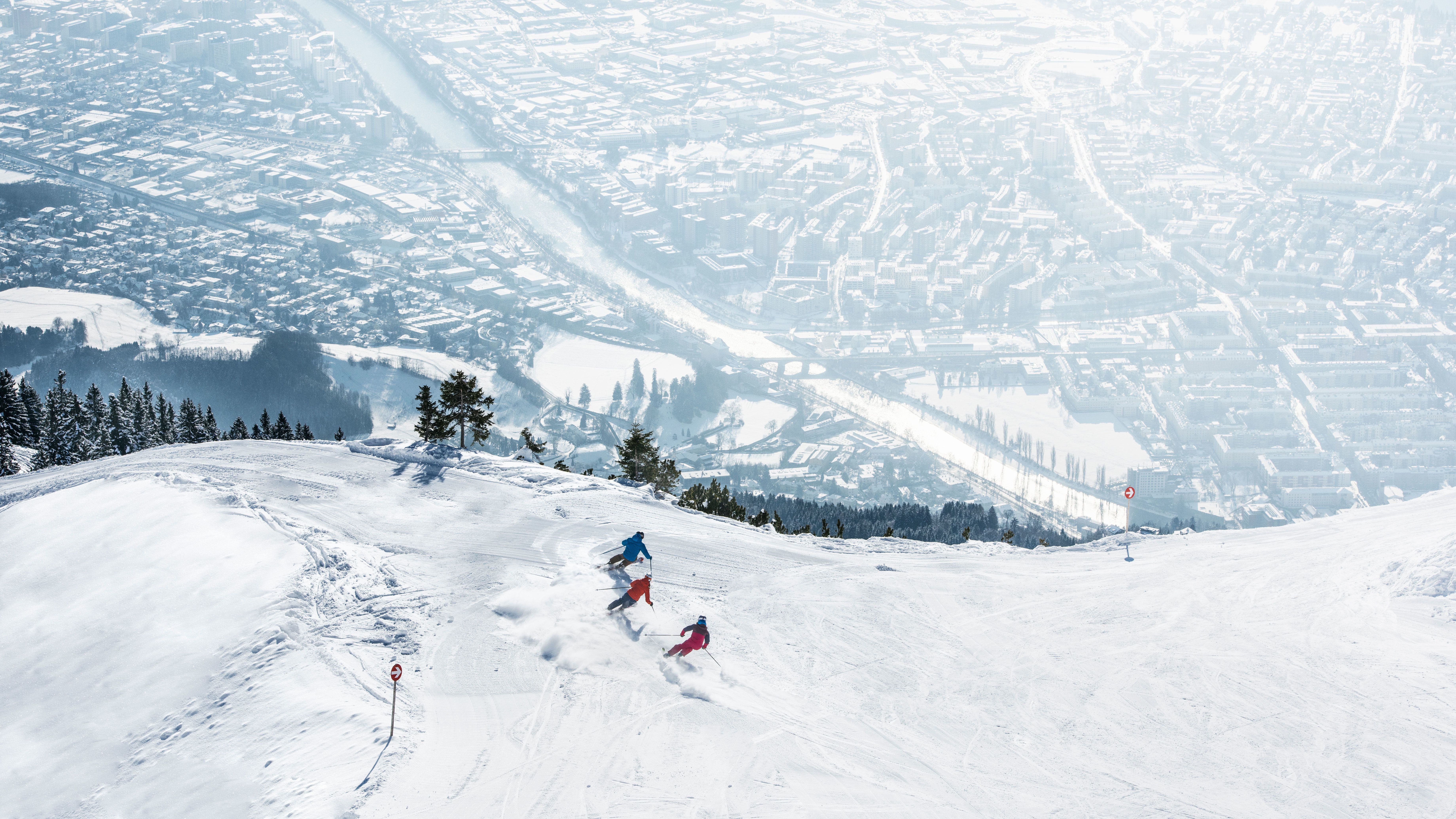 Skiën boven de stad Innsbruck op de Nordkette een onvergetelijke ervaring. Beeld Andre Schoenherr